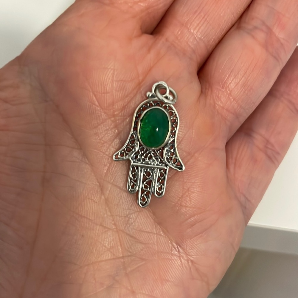 Hamsa silver pendant with green stone